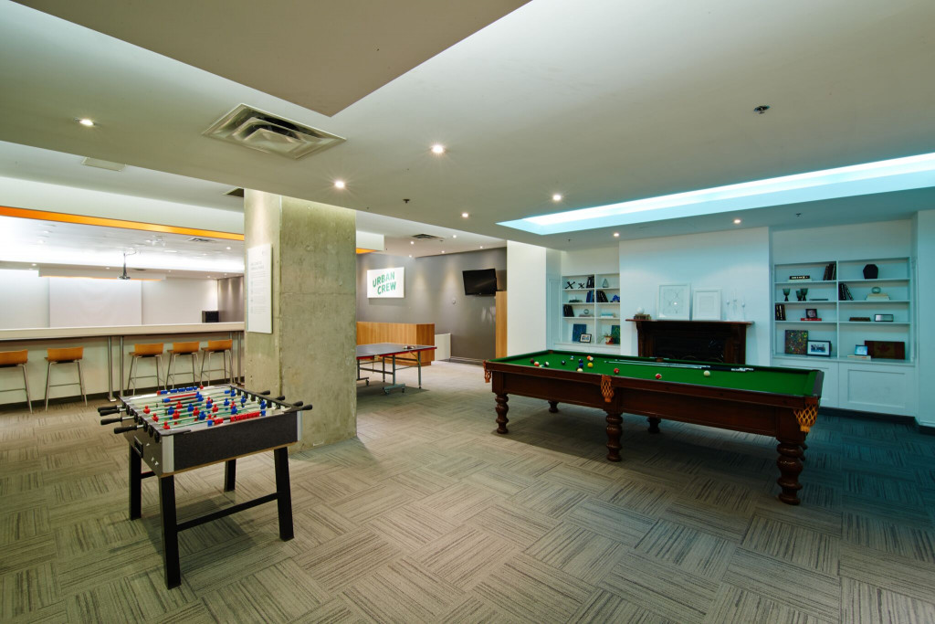 Urban room with pool table and foosball